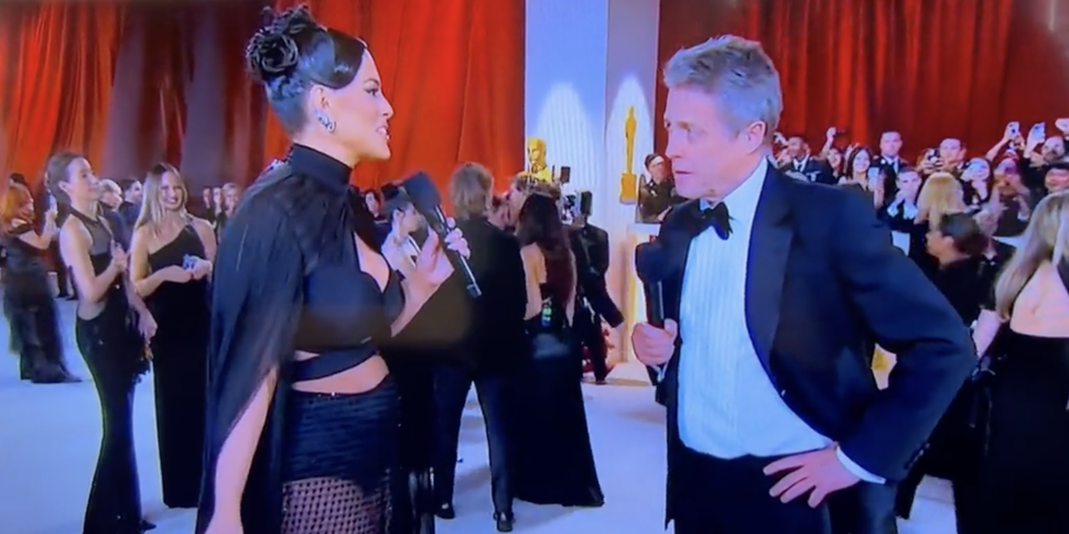 Hugh Grant Is Being Called Out for Acting Super Rude Toward Ashley Graham on the Oscars Red Carpet