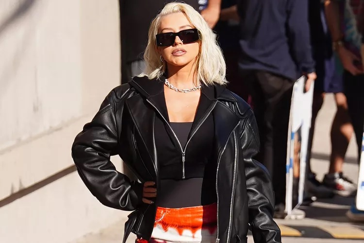 Christina Aguilera Rocks Black Leather Jacket and Lip Print Mini Skirt